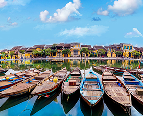 Vietnam holiday destination with colourful boats