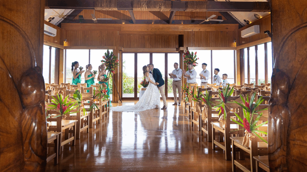 Wedding couple & bridal party at Outrigger Fiji Beach Resort