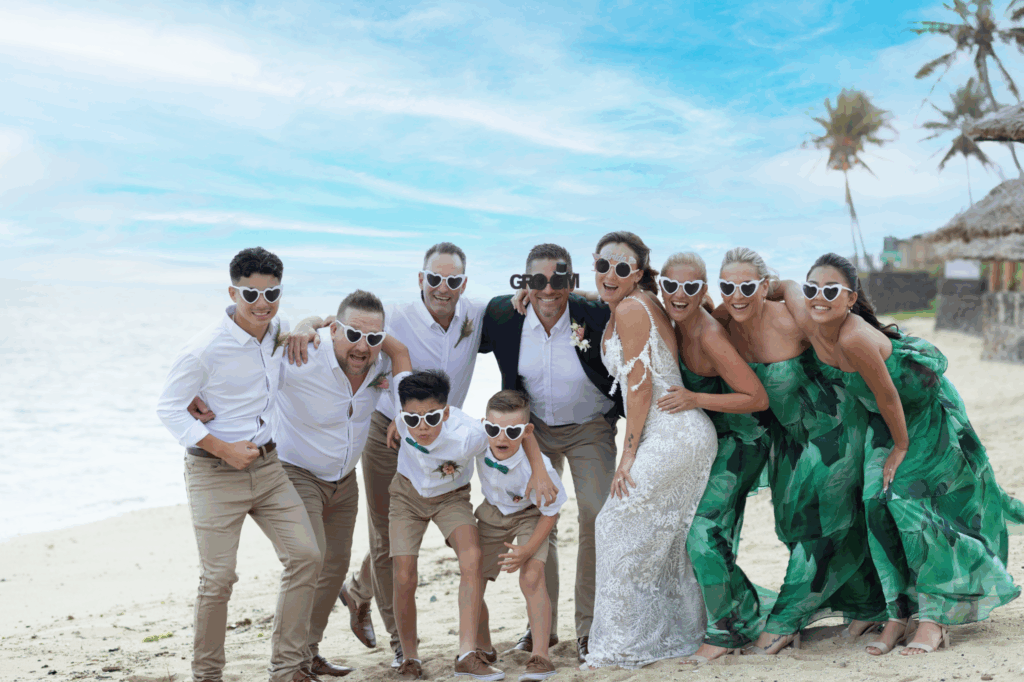 Bridal party on the beach at Outrigger Fiji Beach Resort
