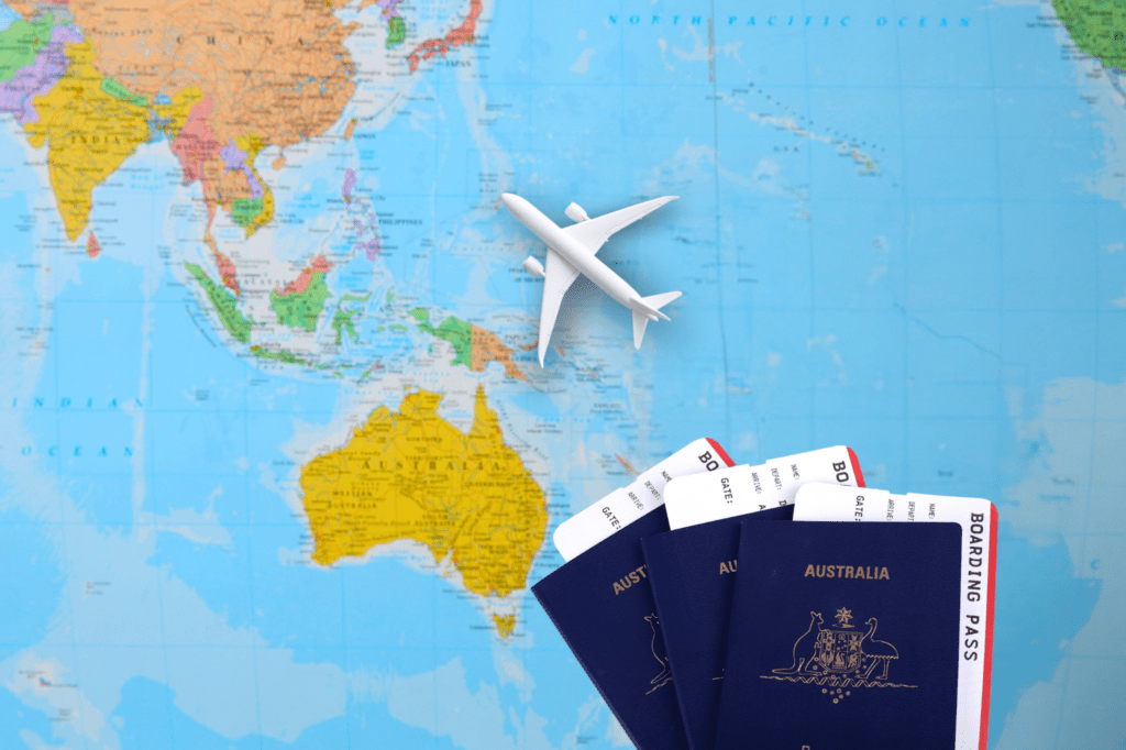 Map of the world showing an airplane and Australia passports