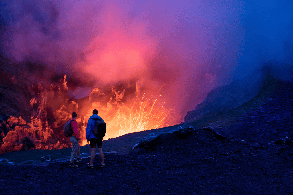 Couple watching Mt Yasur erupting, Tanna Island, Vanuatu